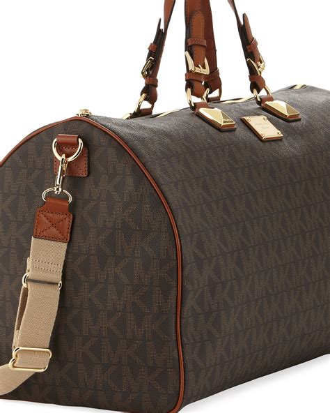 michael kors overnight duffle bag|Michael Kors large suitcase.